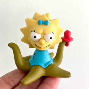 Kidrobot The Simpsons Maggie Simpson alien vinyl toy figure